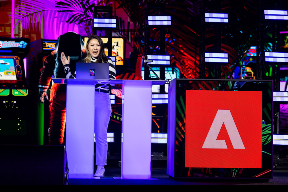 Presenting at AdobeMax with podium.